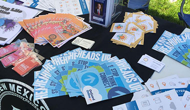 Get-Help-h220 Assorted pamphlets on a black table
